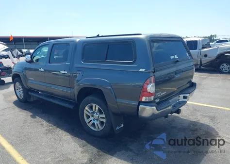 2015 Toyota Tacoma Base V6 z USA, uszkodzony, nr VIN 3TMLU4EN1FM177255